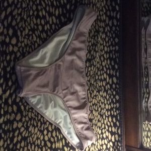 Lavender ruched back swim bottoms.  Never worn!